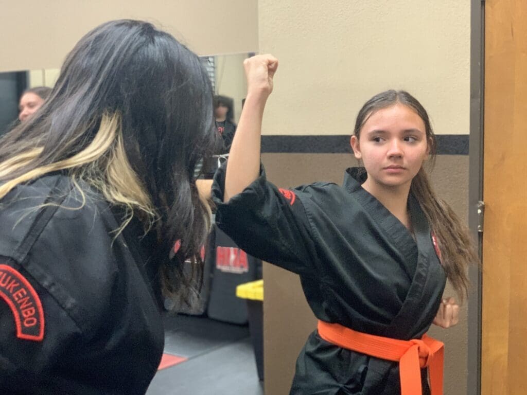 Teen student building confidence and leadership through martial arts in Union City