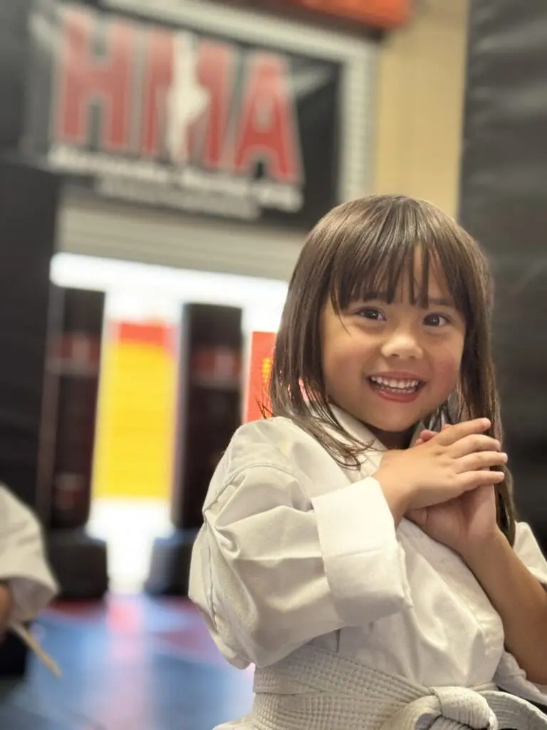 Young child learning focus and confidence in beginner karate class at Hernandez Martial Arts