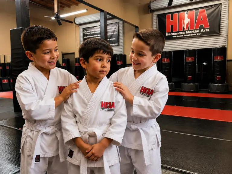 Shy child building confidence through karate classes at Hernandez Martial Arts in Union City